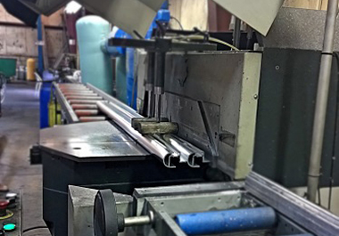 Cutting aluminum xxtrusions in Philadelphia, PA.